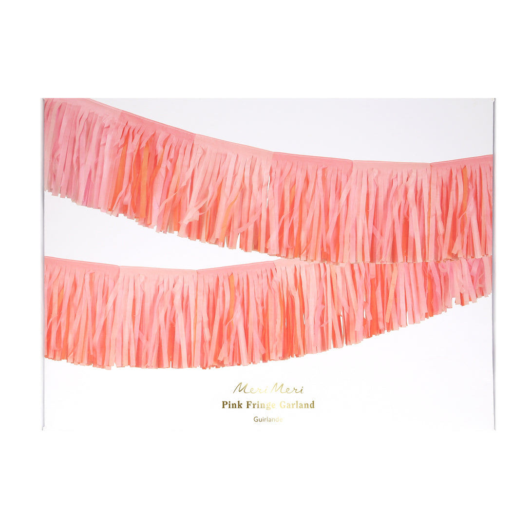 Our fringe garland, made of pink tissue paper, is ideal as a princess party decoration, or for baby showers, bridal showers or fairy parties.