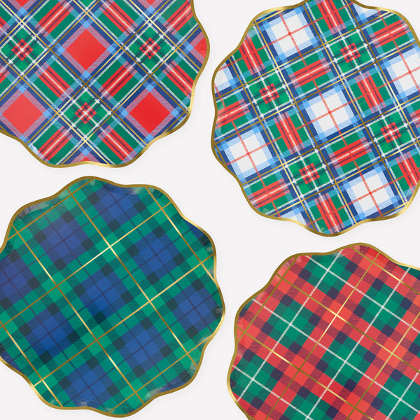 Our Christmas plates, made from paper in a dinner plate size, feature a mix of tartan designs in festive colours with pops of shiny gold foil. Image1