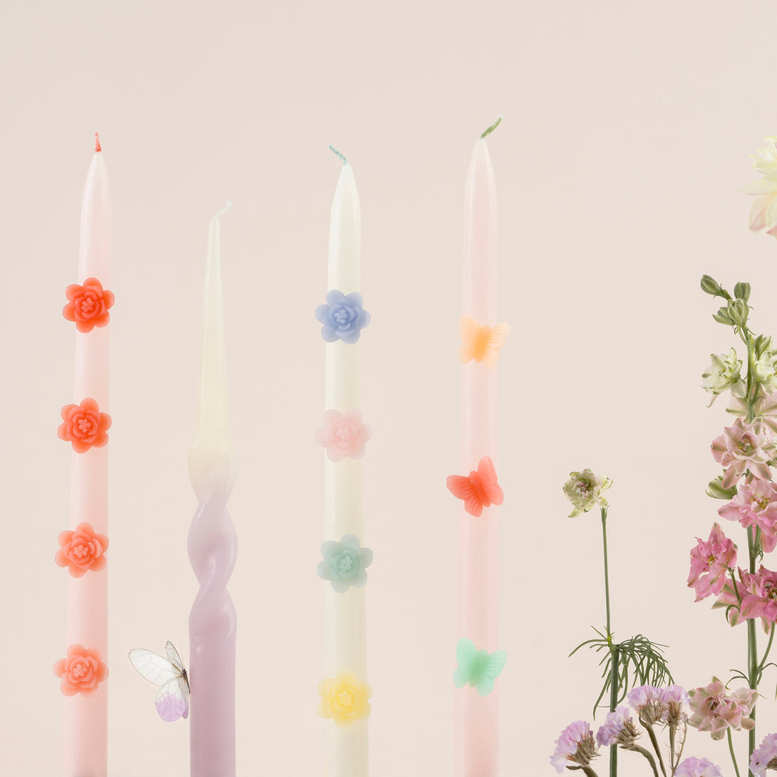 Our tall candles, in pink with coloured wax butterflies, are perfect as princess party candles or fairy party candles.