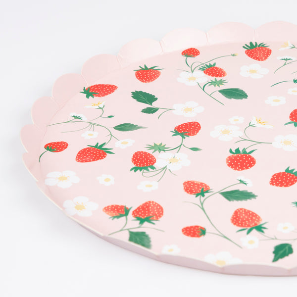Our strawberry party set includes summery party supplies with strawberry designs, including plates, cups, napkins and a garland.  Image6