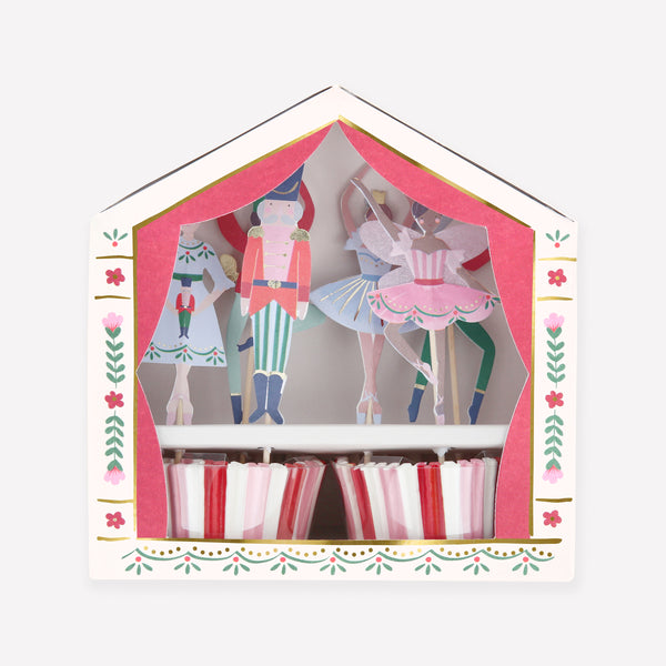 Our cupcake kit features classic Nutcracker character cake toppers and striped cupcake cases, ideal for Christmas treats. Image1
