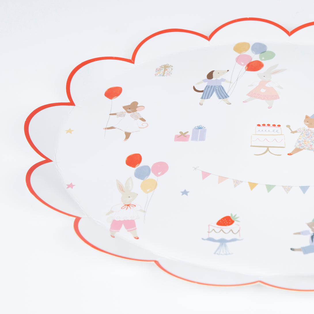 Our Animal Friends party set is ideal for first birthdays, featuring adorable tableware, party bags, party hats and a large paper garland. 