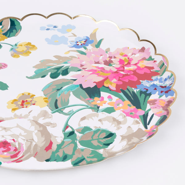 Our paper party plates, in dinner plate size, feature bright florals and a shiny gold foil scalloped border for a really elegant effect. Image3