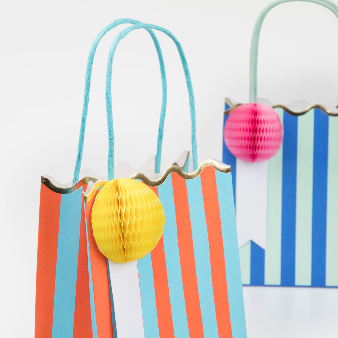 Choose our bright and striped party bags to thrill your party guests.