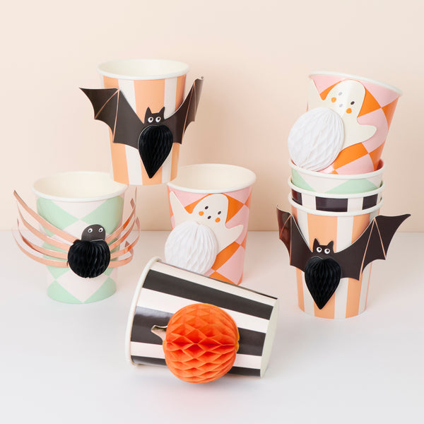 Our Halloween cups feature Halloween icons with honeycomb details, cut out shapes and lots of colour and copper foil for a great effect. Image1