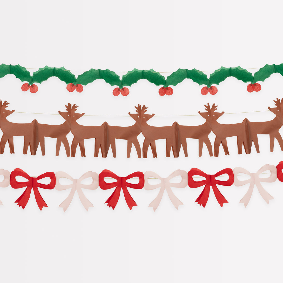 Our classic Christmas garlands, featuring reindeer, bows and holly and berries, are made with colourful tissue paper.