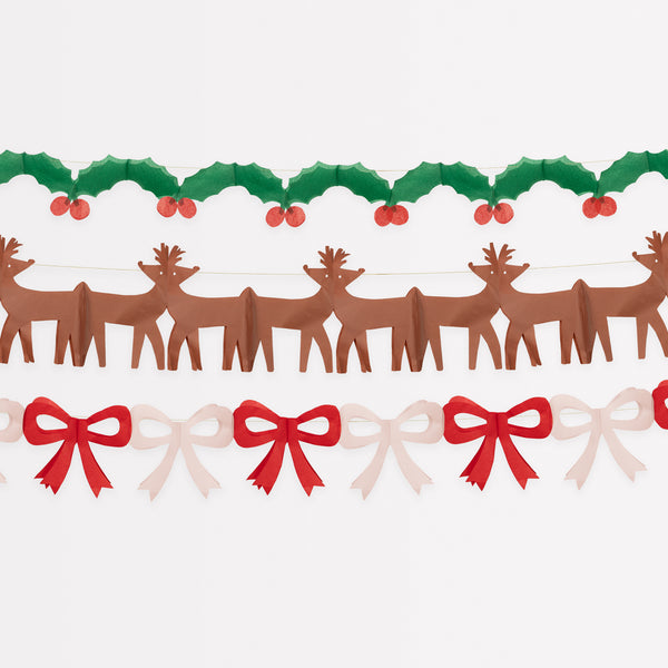 Our classic Christmas garlands, featuring reindeer, bows and holly and berries, are made with colourful tissue paper.