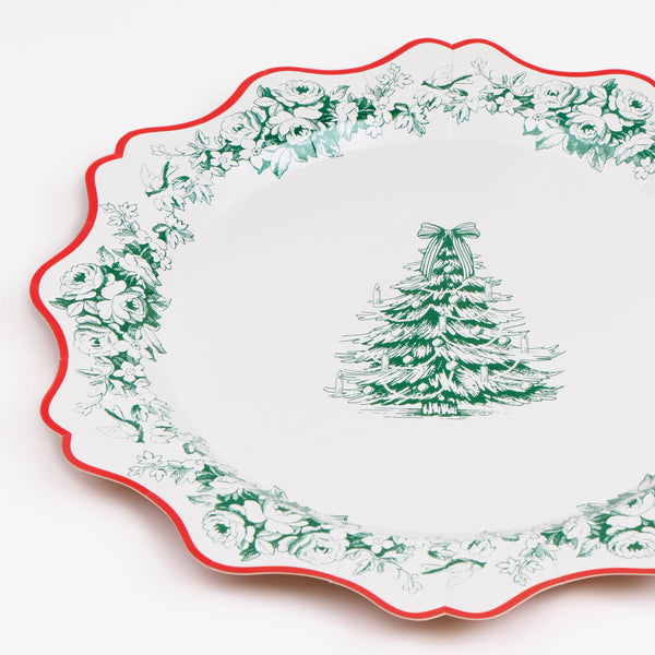 Our Christmas dinner plates, made from heavyweight paper, feature a fancy Toile de Jouy print and a red ornate border for a stylish look. Image2