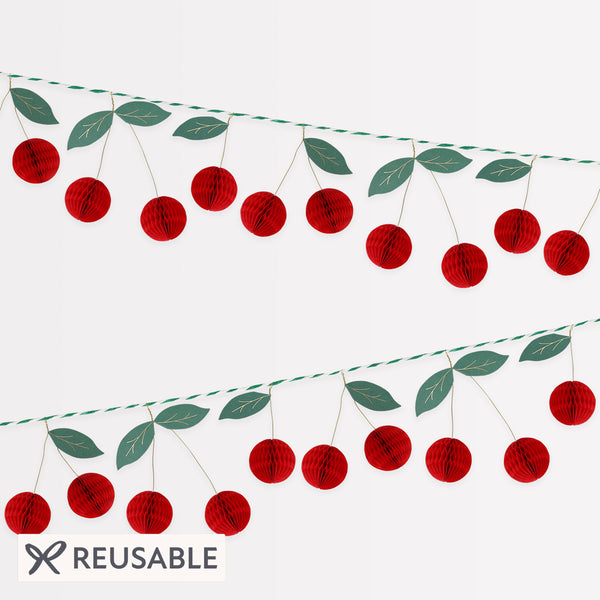 Our paper garland features 3D cherries for a vibrant look, it's perfect as a decoration for a garden party, BBQ or a retro 50s party. Image1