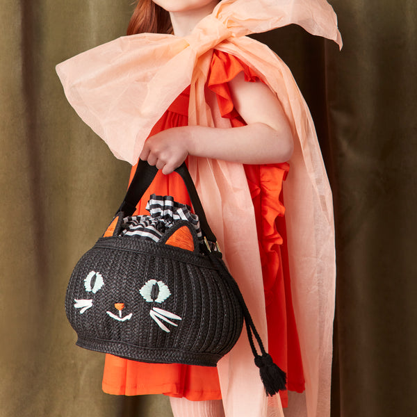 Our Halloween bag, in the shape of a black cat bag, is the perfect reusable trick or treat bag and a great Halloween gift. Image2