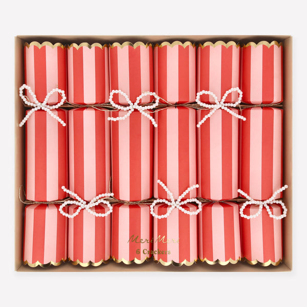 Our Christmas crackers, with bright stripes and faux pearl bow details, which can also be used as tree decorations, contain premium gifts. Image1