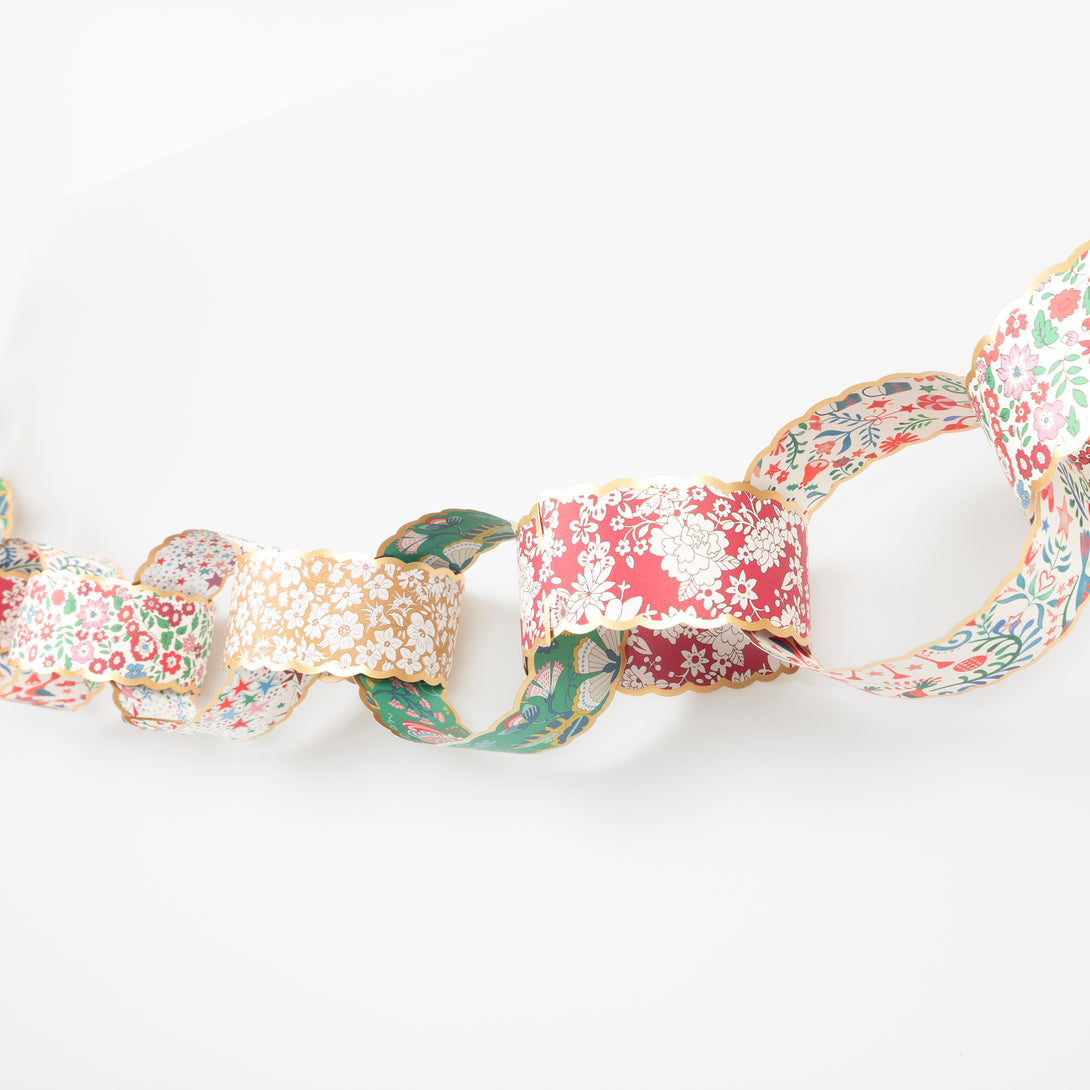 Use our paper chain garland, with Liberty prints in festive colours, as the ideal Christmas hanging decorations. Image3