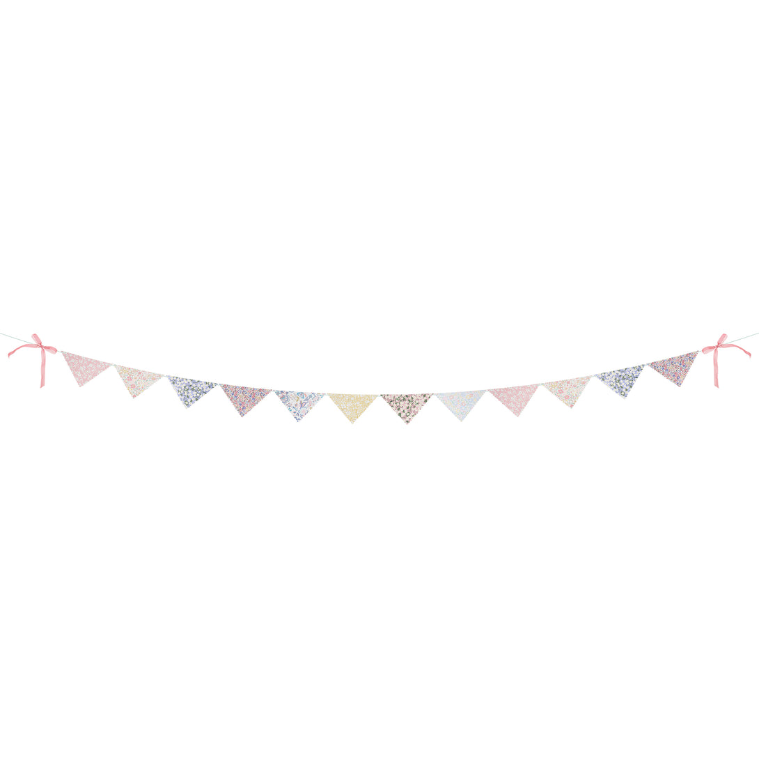 Use our party garland, with floral Liberty print designs and velvet embellishments, as part of your baby shower decorations.