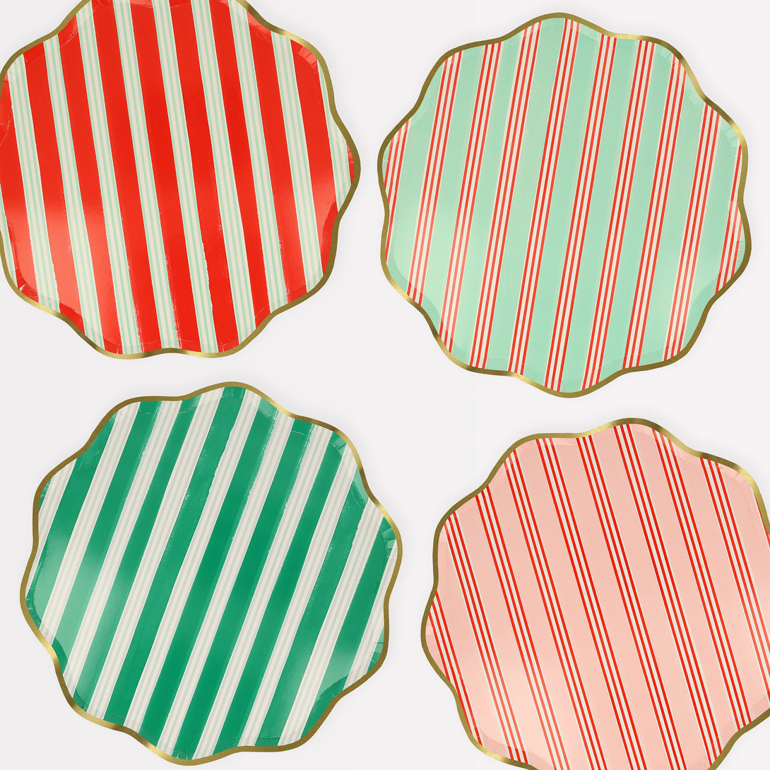 Our Christmas  paper plates feature stylish stripes in festive colours, wavy edges and shiny gold foil borders.