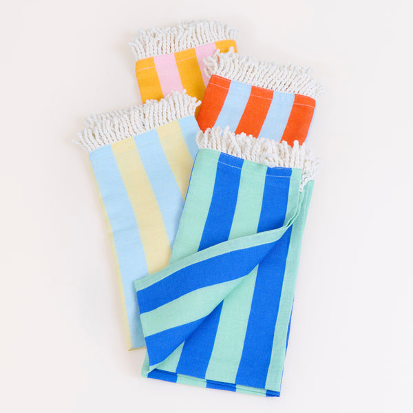 Our fabric napkins, made with a linen and cotton blend, have 4 vibrant striped colourways, perfect to add elegance to any meal. Image5