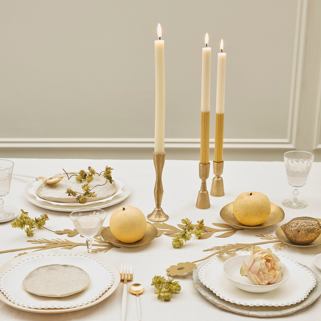 Our gold candles, with an ivory top and gold dipped base, make a wonderful table centrepiece or decoration.