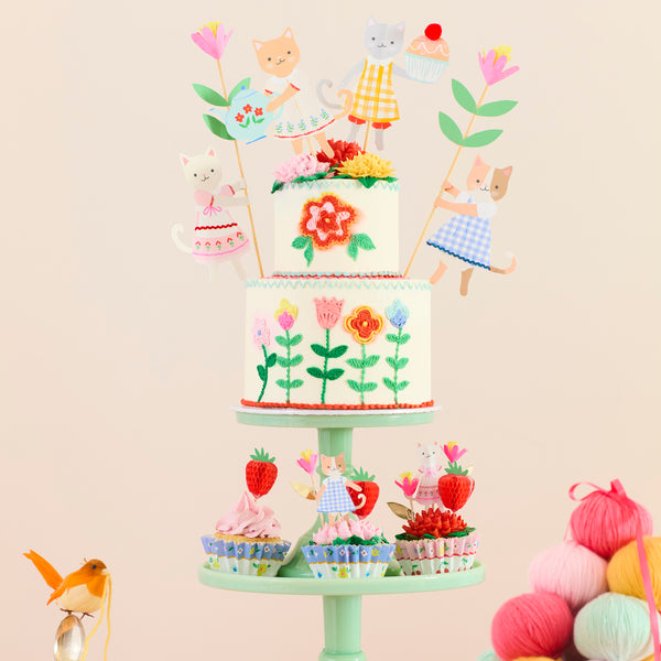 Our cake decorations feature four kittens with adorable embellishments, the perfect toppers to decorate a birthday cake for a kitten party. Image2
