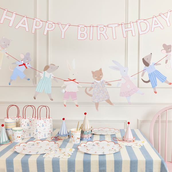 Our Animal Friends party set is ideal for first birthdays, featuring adorable tableware, party bags, party hats and a large paper garland. 