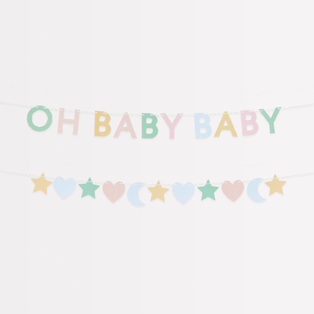 Our baby shower garland set features stars, moons, hearts and the words 'Oh Baby Baby', in pretty pastel colours.