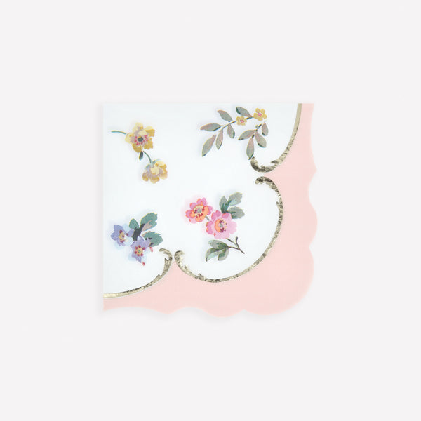 Our pink napkins feature shiny gold foil details, pretty posies and a scalloped edge, to add a touch of charm and beauty to any meal. Image1