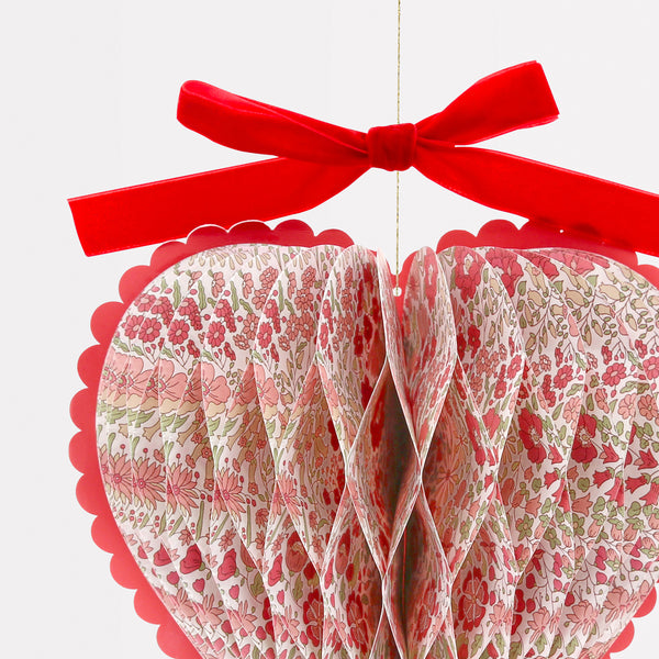 Our honeycomb hearts make wonderful Valentine's decorations. They're made with Liberty floral print designs and elegant velvet bows. Image3