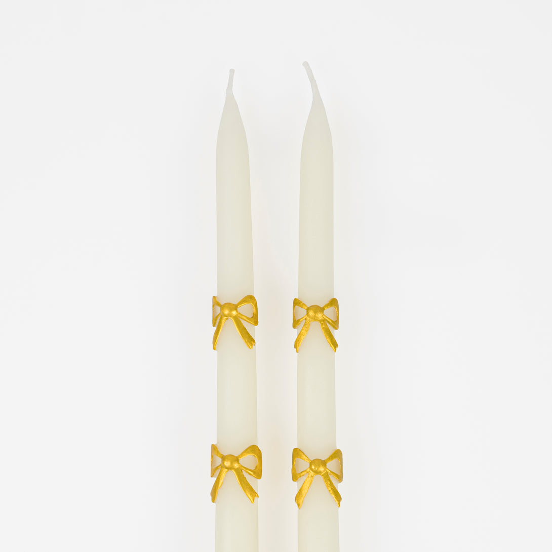Our taper candles, with a bow design, are perfect as Christmas decorative candles. Image4