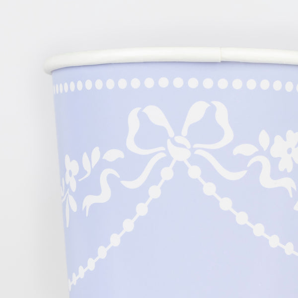 Our paper cups are made in cornflower blue with a white ornate design, perfect for hot and cold drinks for sophisticated parties. Image2