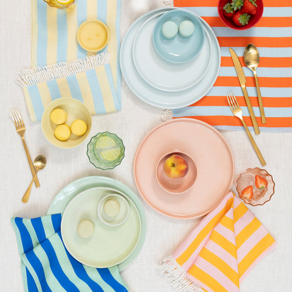 Our fabric napkins, made with a linen and cotton blend, have 4 vibrant striped colourways, perfect to add elegance to any meal. Image2