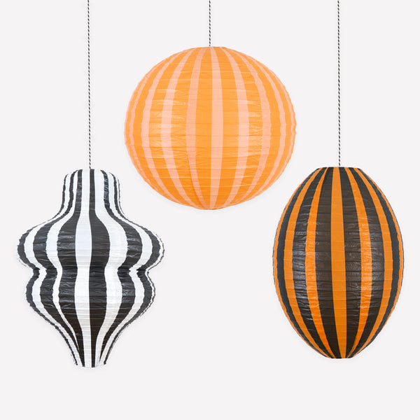 Our Halloween lanterns, made with paper over wire, feature bright stripes in classic Halloween colours for a bold decorative look. Image1