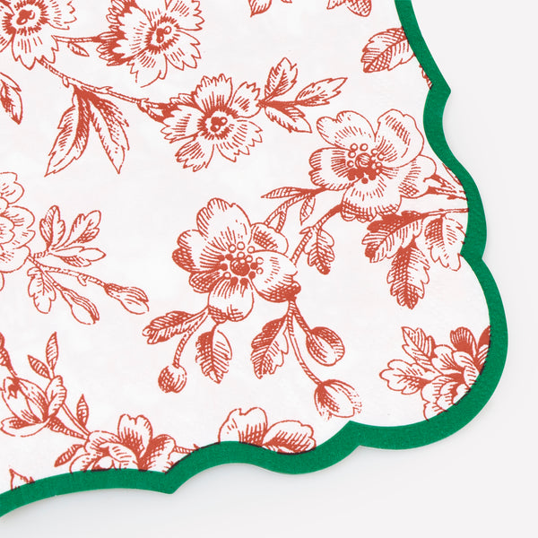 Our small Christmas paper napkins, made from 3-ply paper, feature an elegant Toile de Jouy design in red and green with coordinating borders. Image2