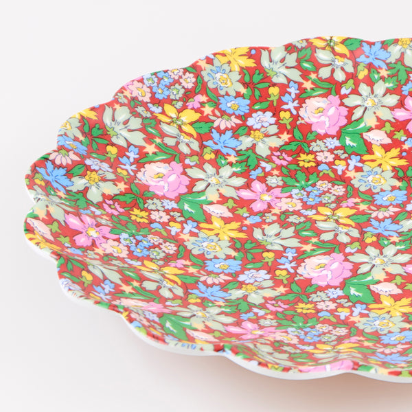 Our small Christmas melamine plates feature 8 Liberty floral print designs in red and green tones for a stylish look, year after year. Image3