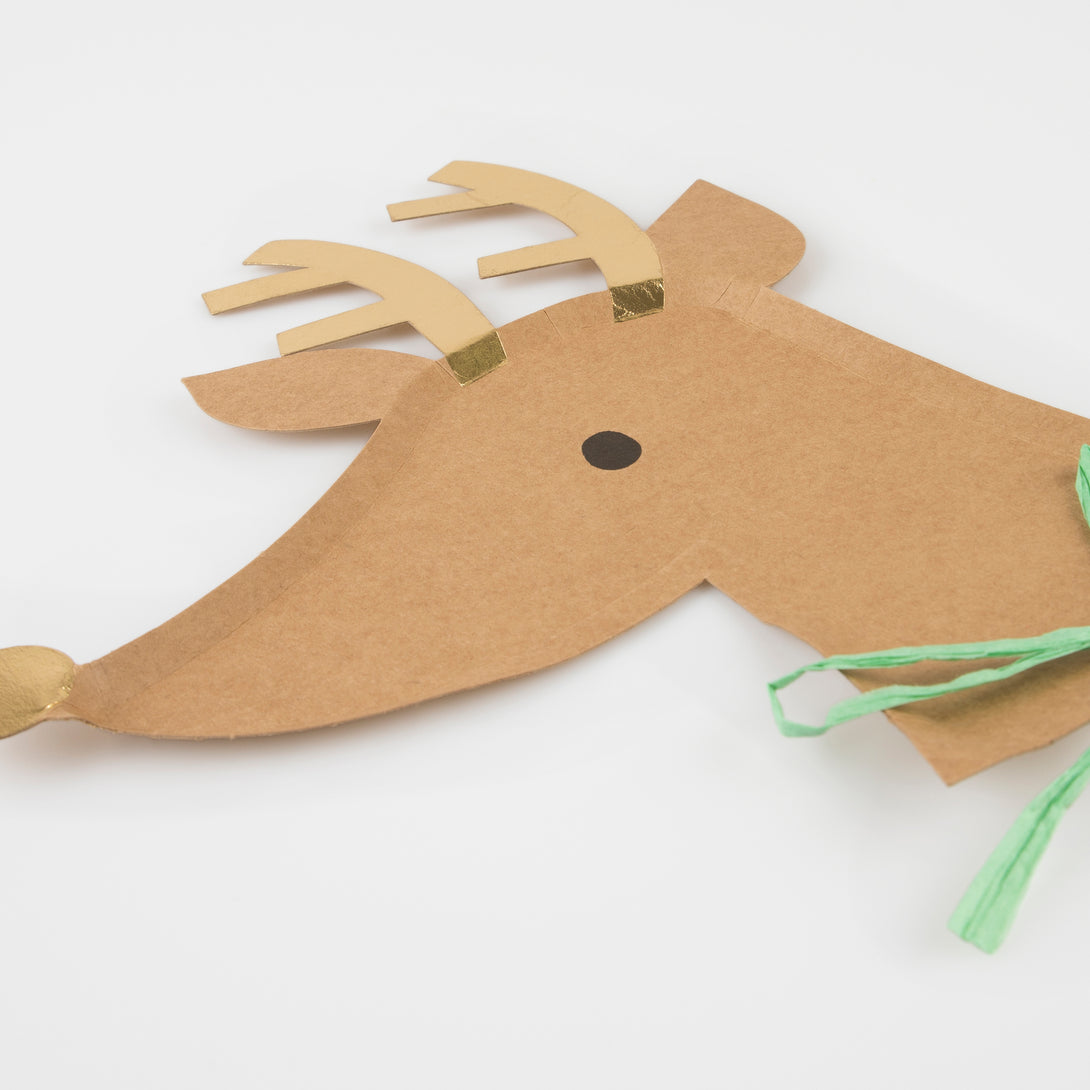 Our reindeer plates are embellished with paper bows and shiny gold foil for a really festive look.