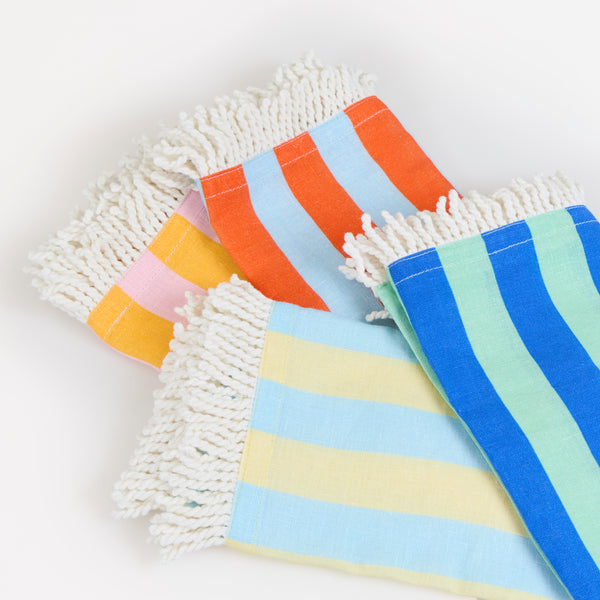 Our fabric napkins, made with a linen and cotton blend, have 4 vibrant striped colourways, perfect to add elegance to any meal. Image3
