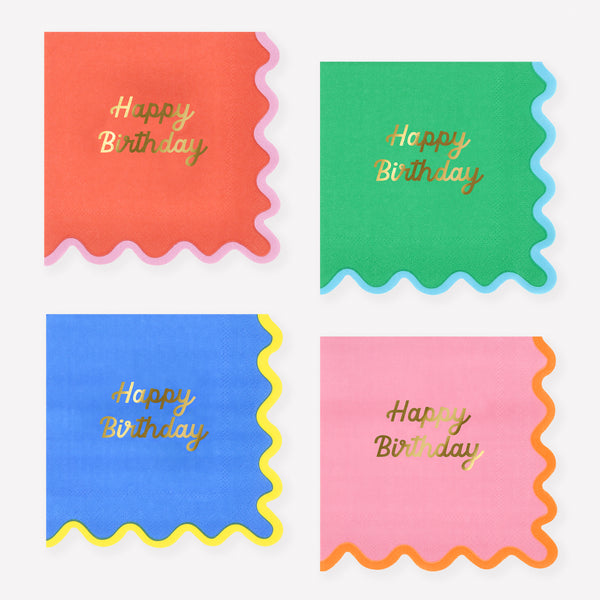Our birthday napkins, made from paper in a small size, feature four bright colourways, a ricrac style edge, and a shiny gold foil Happy Birthday. Image1