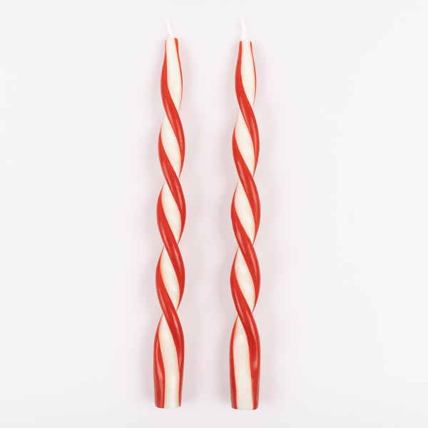 Add a colourful look to your Christmas table with our ivory candles with a stunning twist of red. Image3