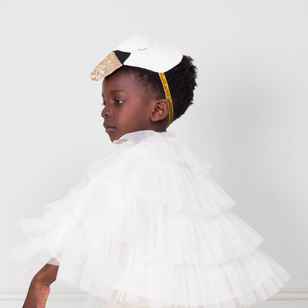 Our swan dress-up outfit features a tulle cape and an embellished headdress, perfect for Halloween, a princess party or for fun play. Image2