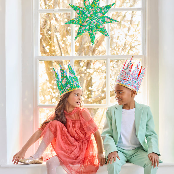 Our party crowns feature stylish Liberty floral prints, bold stripes on the inside, scalloped bands and gold foil stars, with an adjustable fit. Image2