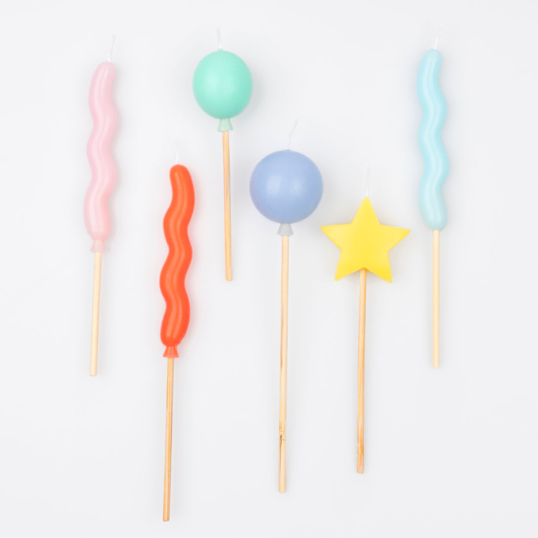 Our birthday candles are great as birthday cake decorations, featuring balloon shapes and bright colours.