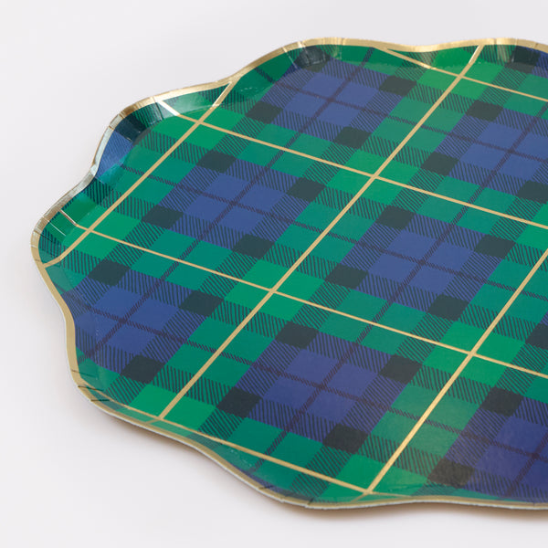 Our Christmas plates, made from paper in a dinner plate size, feature a mix of tartan designs in festive colours with pops of shiny gold foil. Image3