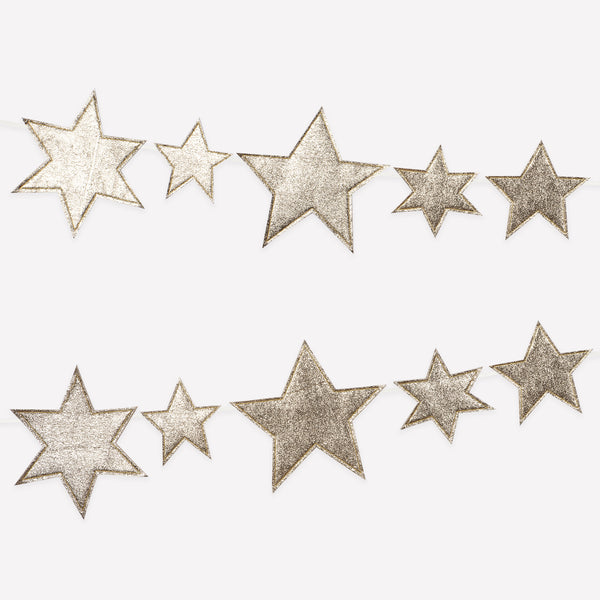 Our gold garland, with sparkling faux leather stars, adds shimmer and shine to any celebration. Image1