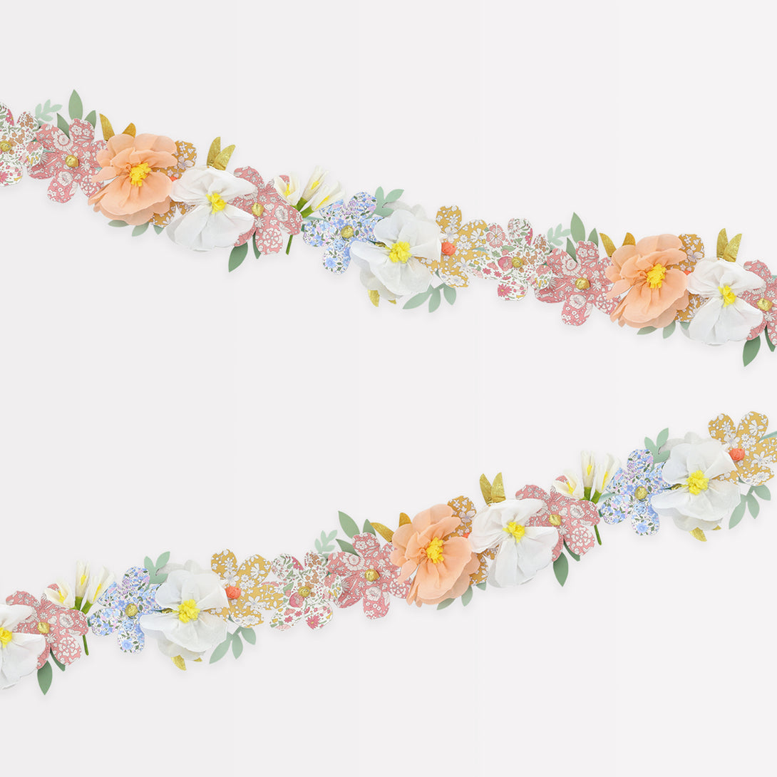 Our floral garland features pretty Liberty prints, making it wonderful for home decoration or as a baby shower decoration.