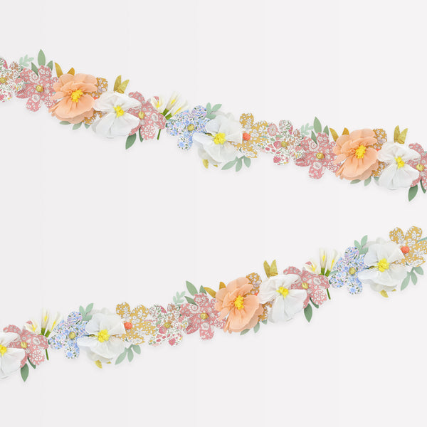 Our floral garland features pretty Liberty prints, making it wonderful for home decoration or as a baby shower decoration.