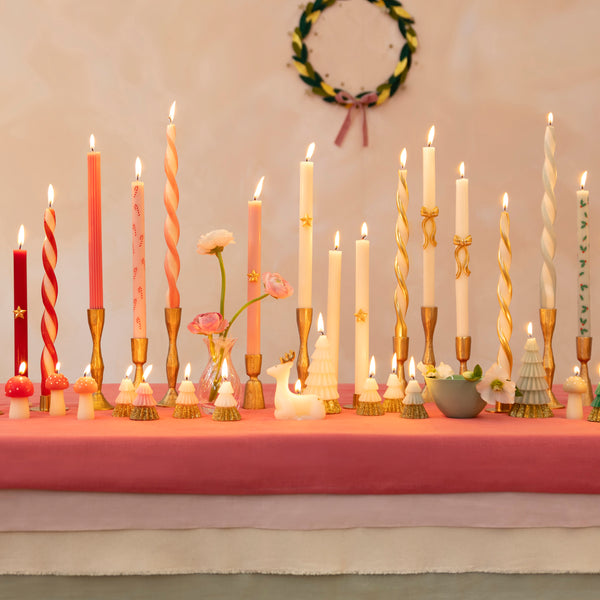 Use our twisted candles, in red, pink, blue, green and ivory, for a wonderful effect on your Christmas table or mantel. Image2