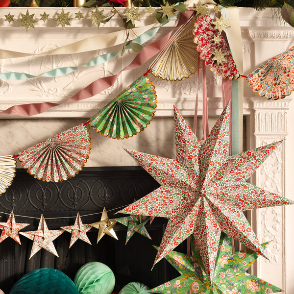 Our elegant Christmas garland has Liberty prints and matt gold foil details, pre-threaded on to a stylish red velvet ribbon. Image2