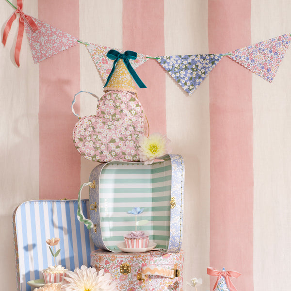 Use our party garland, with floral Liberty print designs and velvet embellishments, as part of your baby shower decorations. Image2