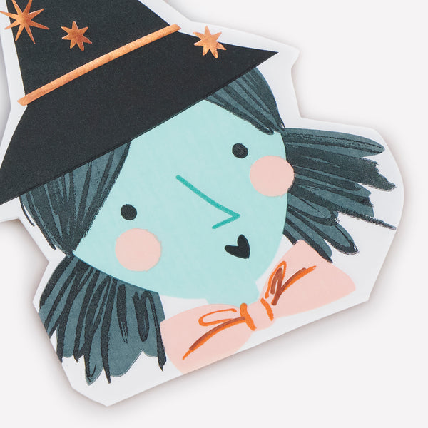 Our Halloween napkins, in the shape of a witch's face, feature shimmering copper foil details, ideal to elevate your party table. Image3