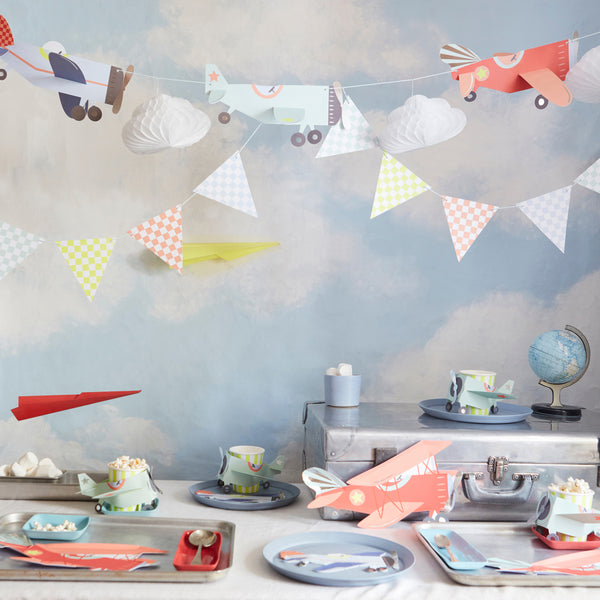 Kids who love airplanes will love our airplane party set which includes an airplane garland, plates, napkins and cups.  Image2