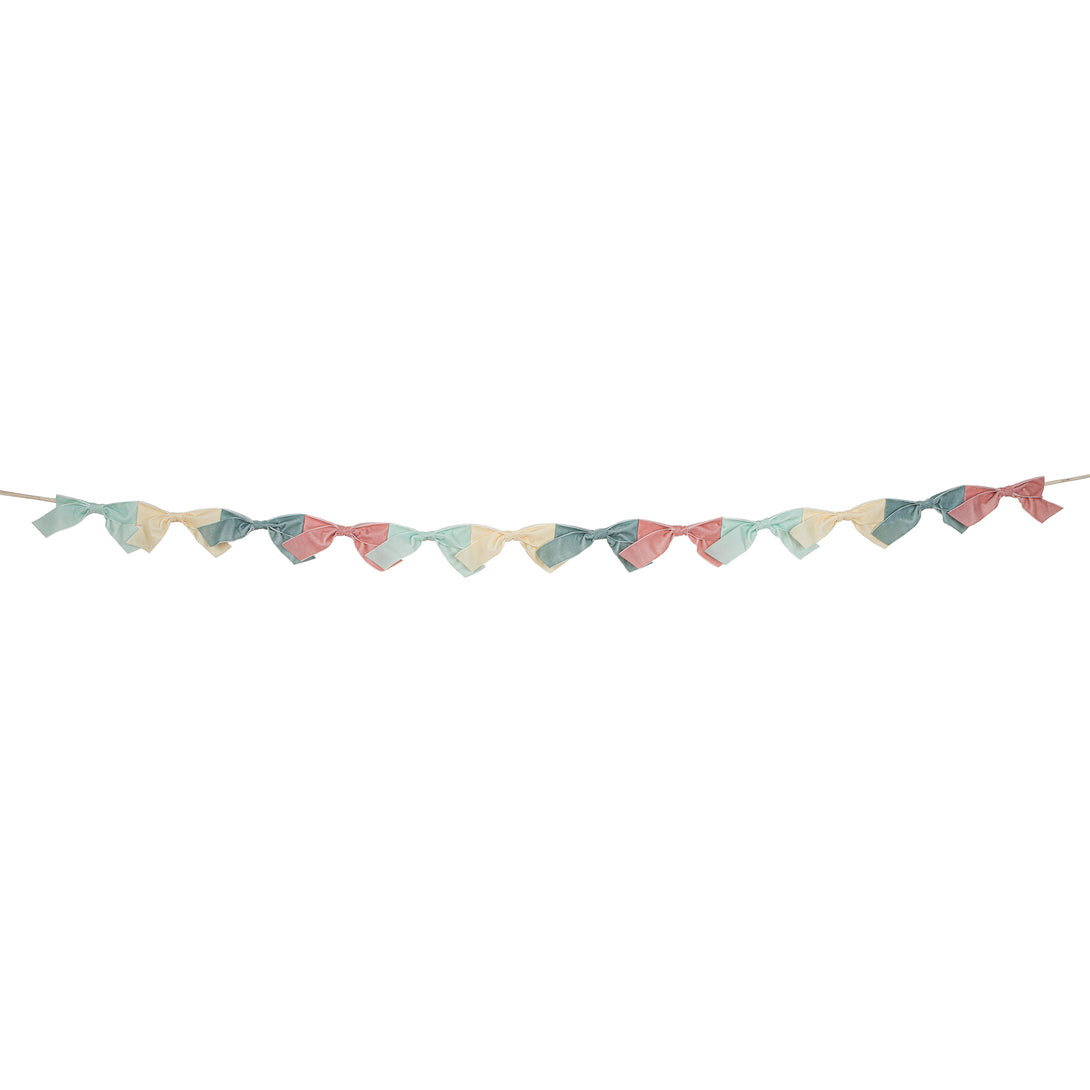 Our velvet bow fabric garland makes a special hanging decoration for a baby shower or bridal shower.