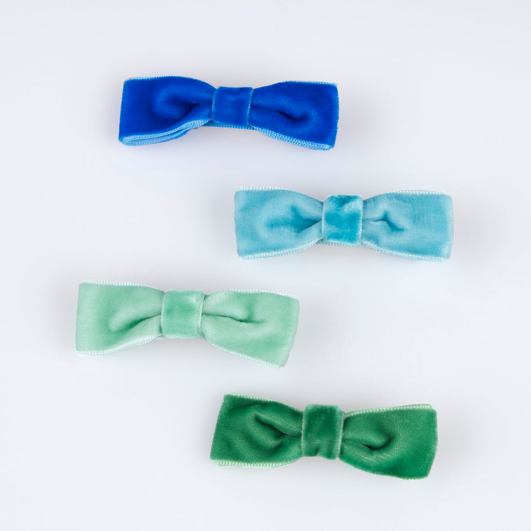 Our hair clips feature different coloured velvet bows, with gold tone clips, for stylish hair accessories.