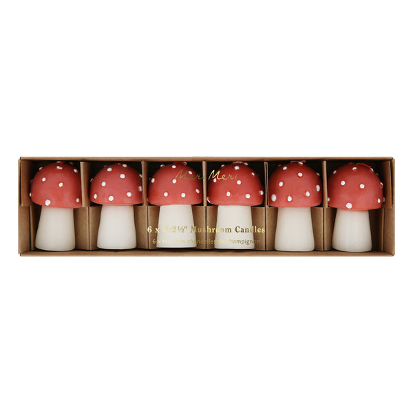 Our Christmas candles, are shaped like little mushrooms, in red and white with red wicks. Image6